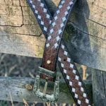 brown inlay western leather belt with geometric pattern and engraved buckle