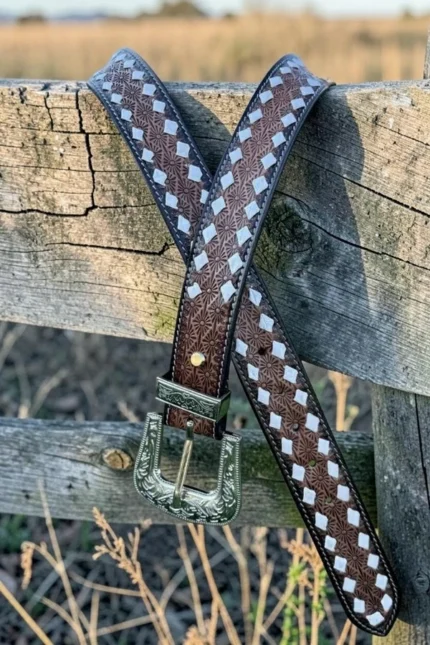 brown inlay western leather belt with geometric pattern and engraved buckle