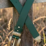 green textured western leather belt with engraved buckle and tip
