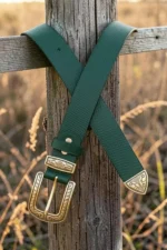 green textured western leather belt with engraved buckle and tip