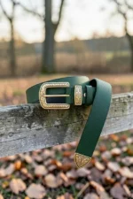 green-textured-western-leather-belt-with-engraved-buckle-and-tip-detailed-view