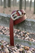 red-tooled-western-leather-belt-with-engraved-buckle-and-decorative-tip