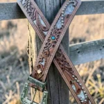 tooled western leather belt with hair-on hide panels stud accents and turquoise detail