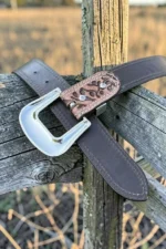 tooled-western-leather-belt-with-hair-on-hide-panels-stud-accents-and-turquoise-detail-back-view