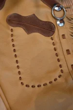 Golden Prairie Fringe Shotgun Chaps with Brown Leather Yoke Pocket View