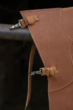 Sierra Trail Leather Chink Chaps with Fringe and Concho Details Hooks View
